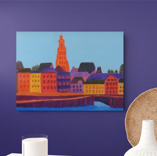 Fine art print of the IJsselkade in Zutphen displayed in a contemporary interior with a purple wall, white decorative accessories.