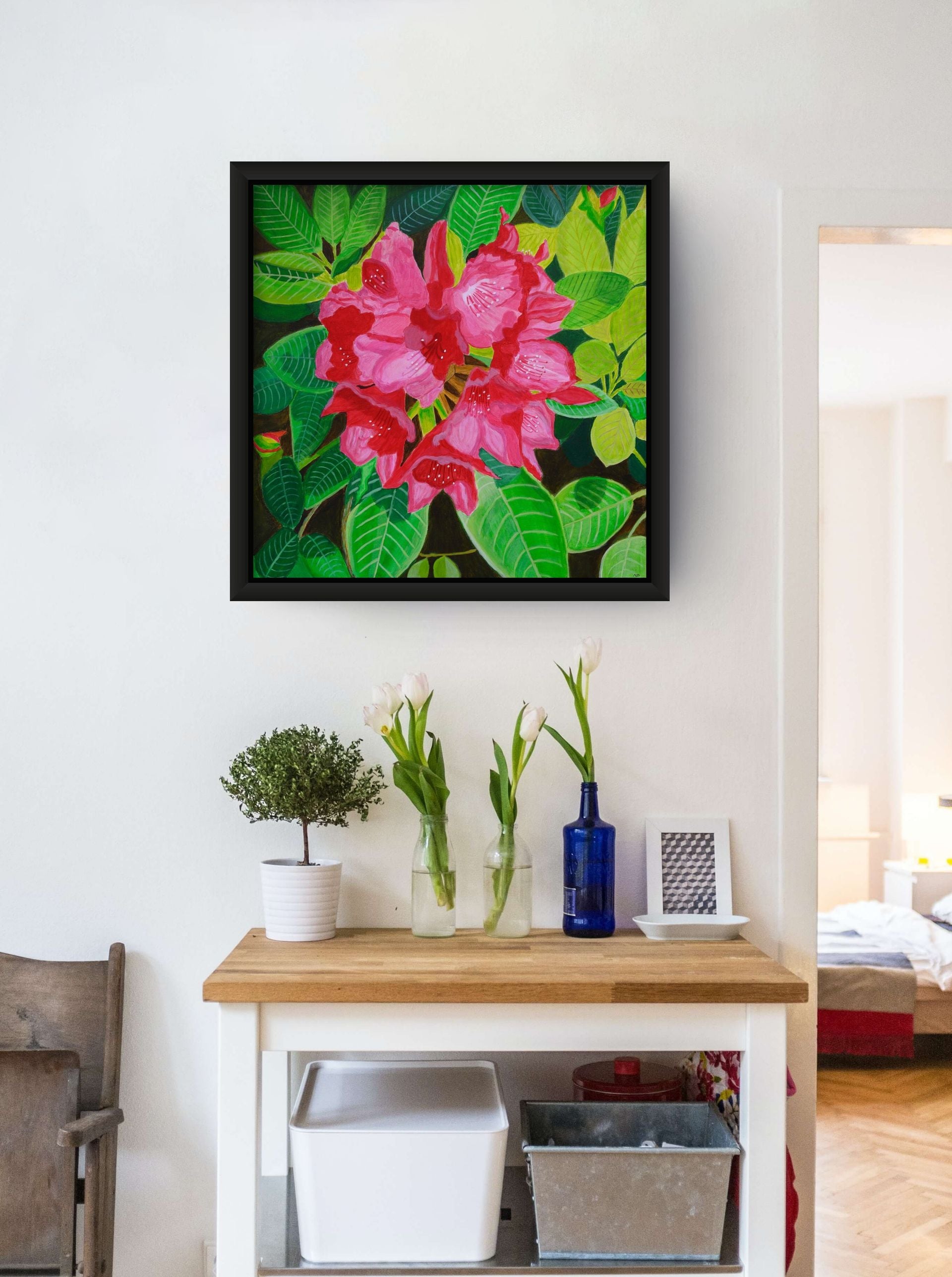 Éclat de Rhododendron canvas print by Nelleke Bruno displayed in a styled interior setting.