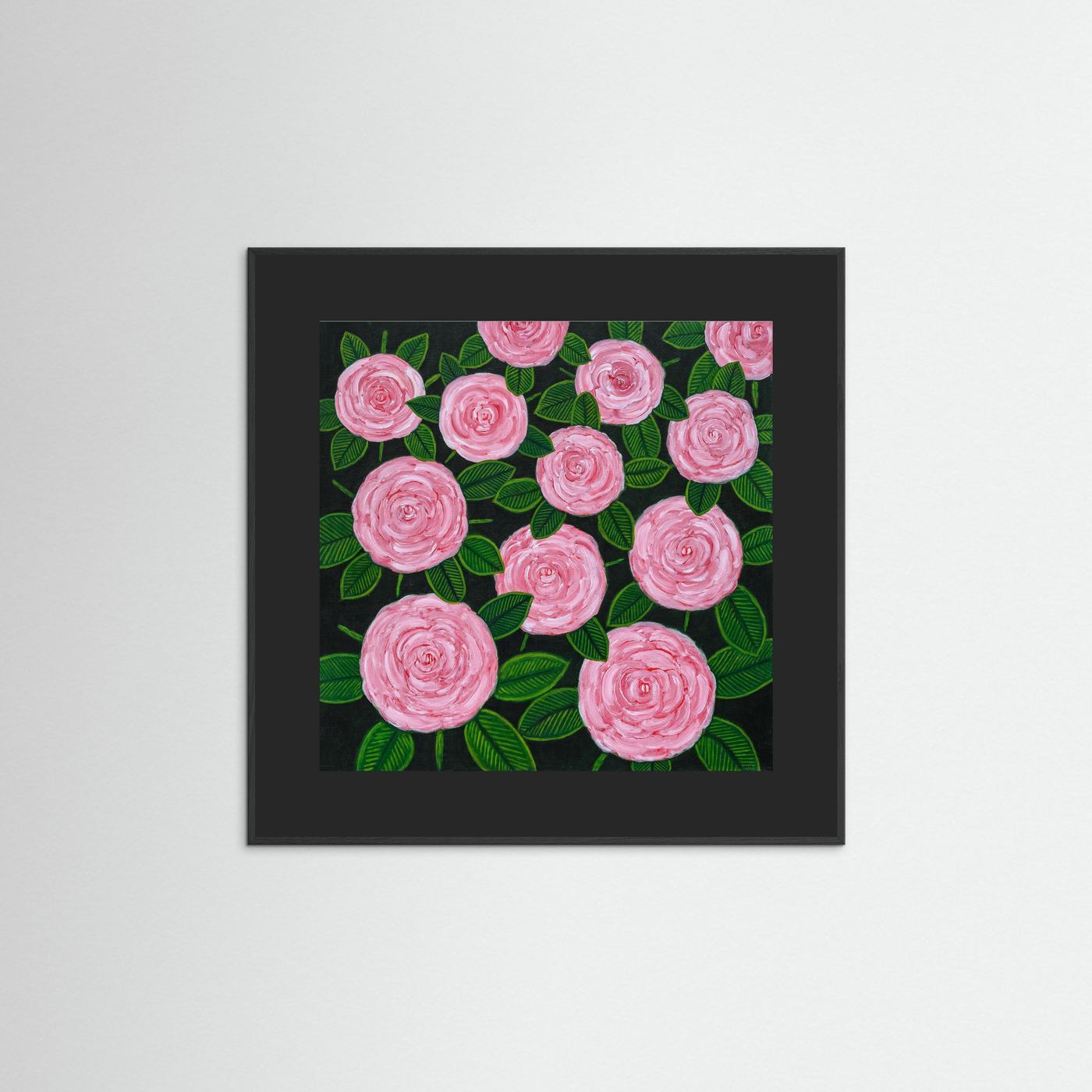 Éclat des Roses fine art print by Nelleke Bruno in a black frame with a black pass-partout, featuring expressive pink and red roses inspired by French gardens.