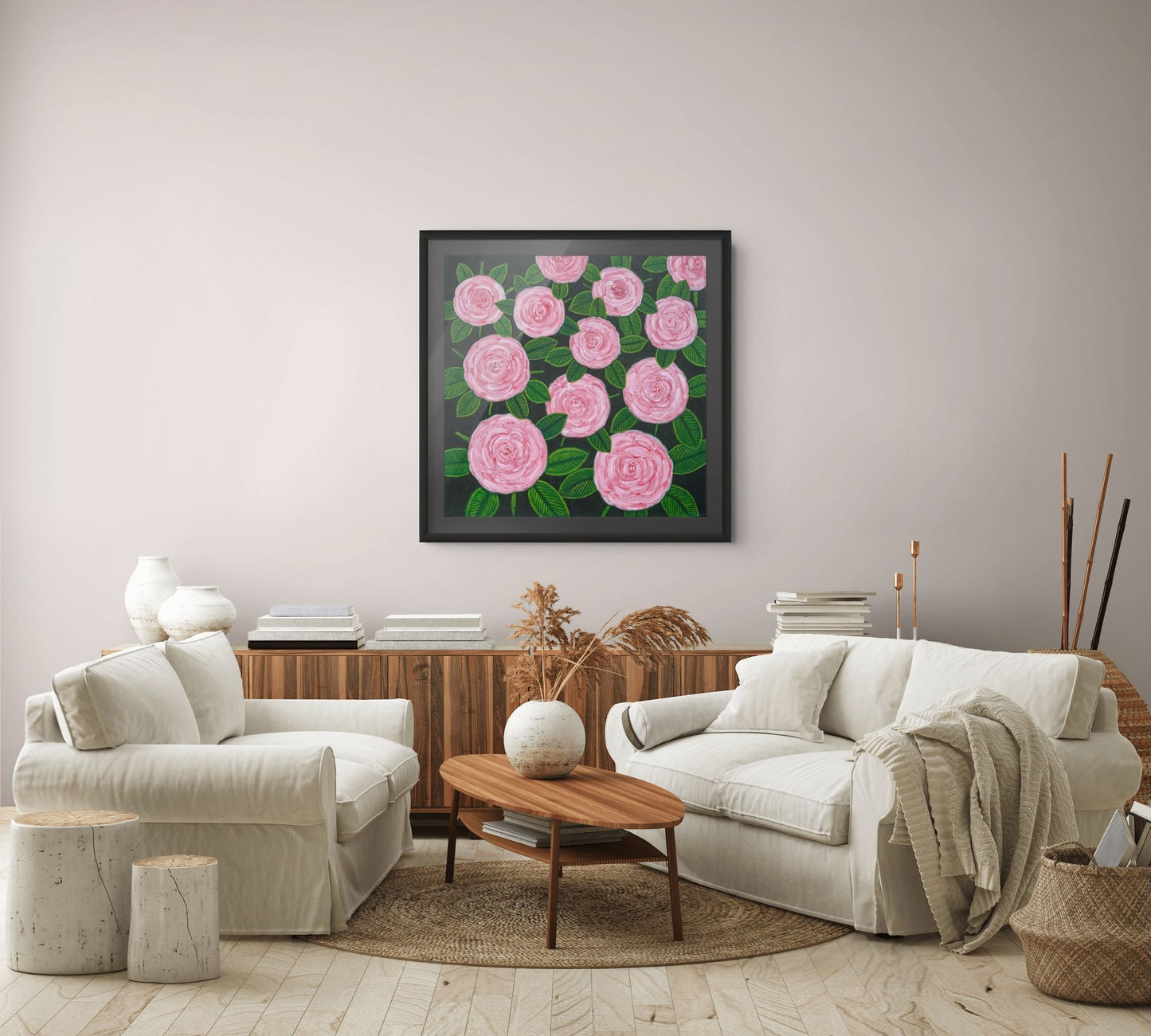Éclat des Roses floral wall art by Nelleke Bruno displayed above a sofa in a contemporary living room, adding colour, elegance and a French-inspired atmosphere.